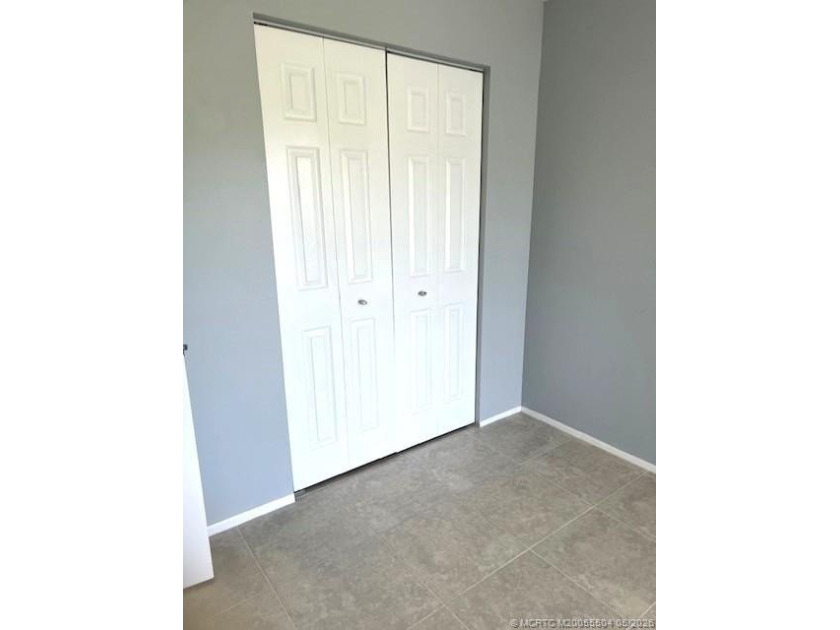 Beautifully tiled 2nd floor 2-bedroom 2-bath unfurnished condo - photo 15
