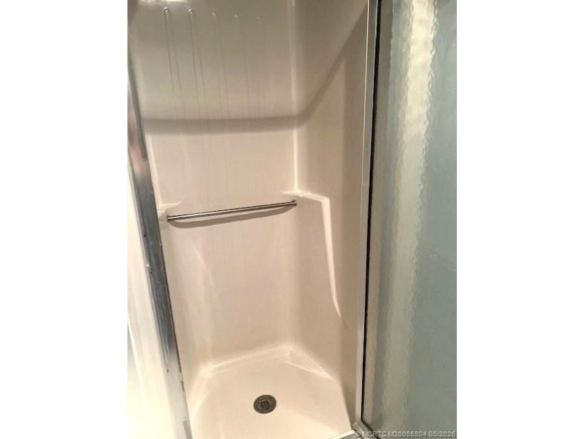 Beautifully tiled 2nd floor 2-bedroom 2-bath unfurnished condo - photo 16