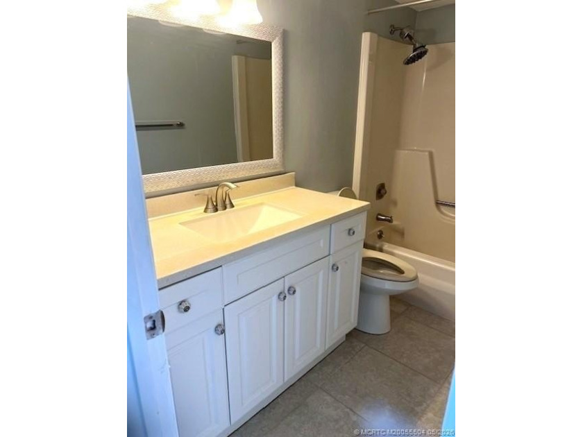 Beautifully tiled 2nd floor 2-bedroom 2-bath unfurnished condo - photo 21