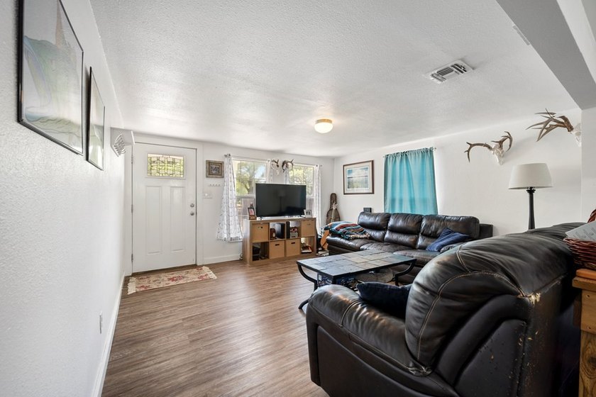 Welcome to 406 W Bay, a charming 3-bedroom, 1-bath home ideally - photo 3