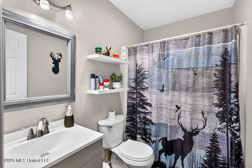 Welcome home to this inviting 4-bedroom, 2-bath home situated on - photo 21
