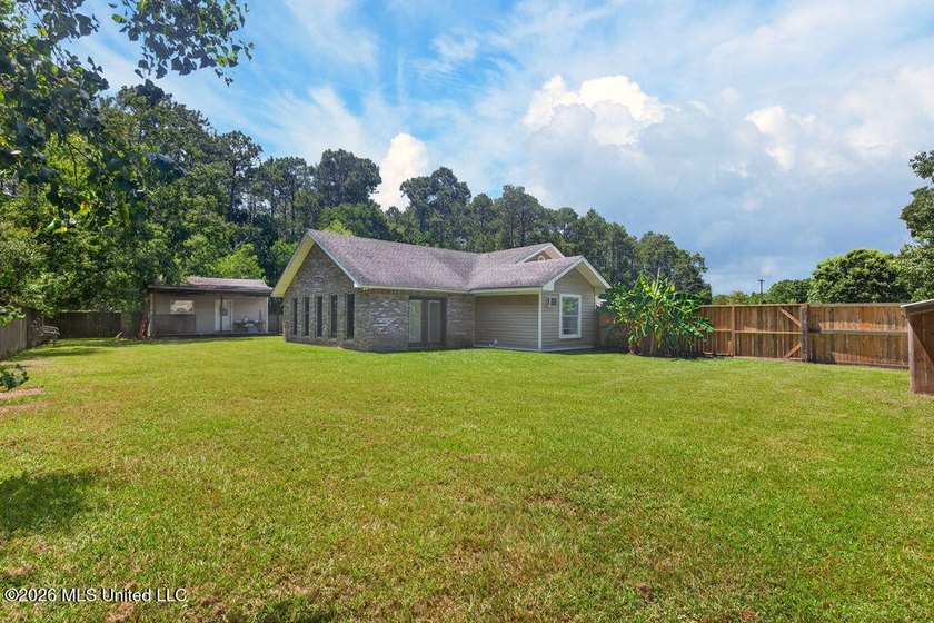 Welcome home to this inviting 4-bedroom, 2-bath home situated on - photo 29