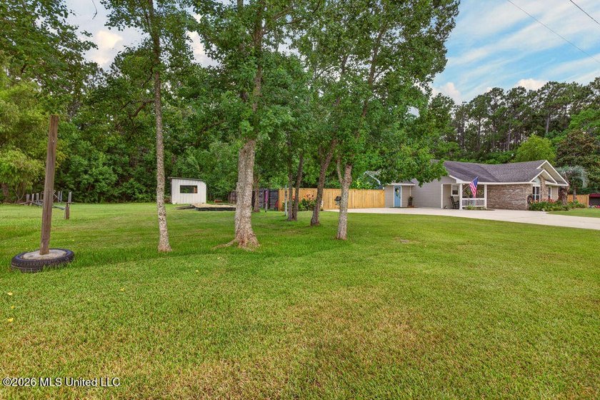 Welcome home to this inviting 4-bedroom, 2-bath home situated on - photo 31