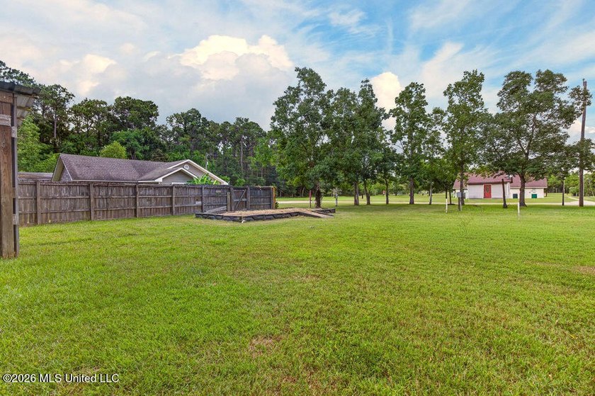 Welcome home to this inviting 4-bedroom, 2-bath home situated on - photo 32