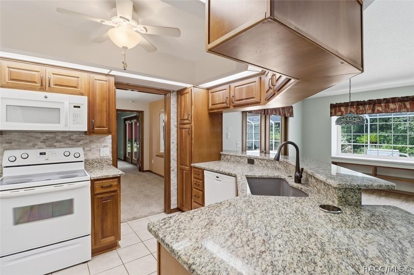 Custom-built Sweetwater pool home loaded with updates and charm! - photo 3