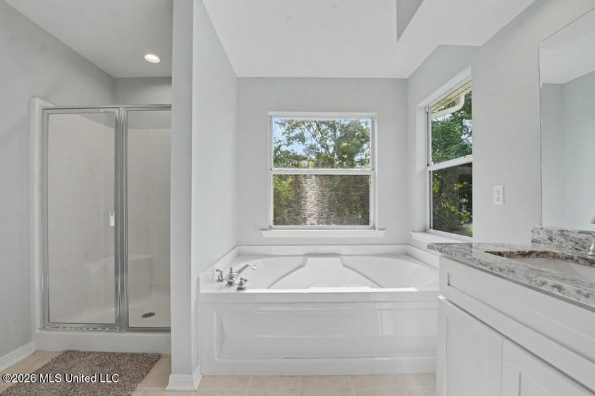 Beautifully updated 4-bedroom, 3-bath home located in the highly - photo 17