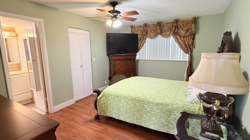 Wellmaintained 2ndfloor corner unit with a bright convertible - photo 7