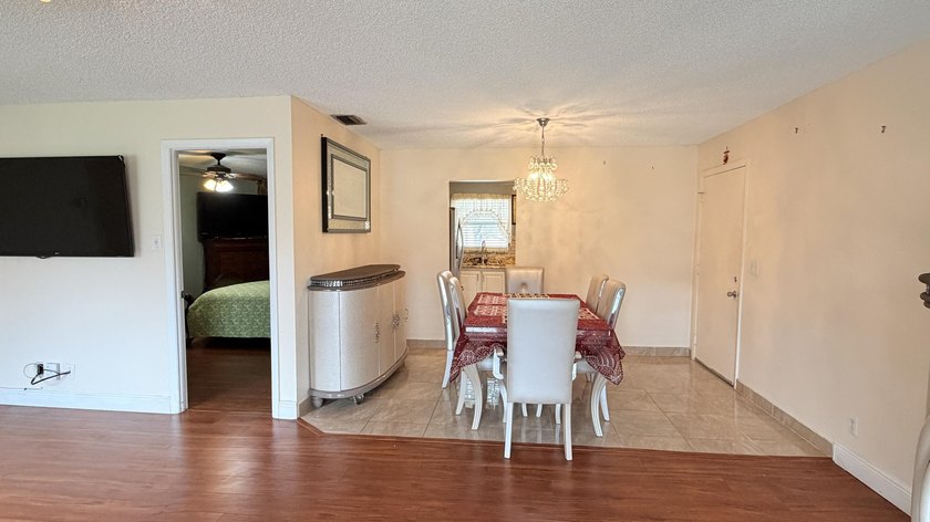 Wellmaintained 2ndfloor corner unit with a bright convertible - photo 10