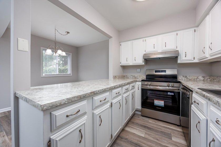 Discover easy coastal living in this beautifully renovated - photo 14