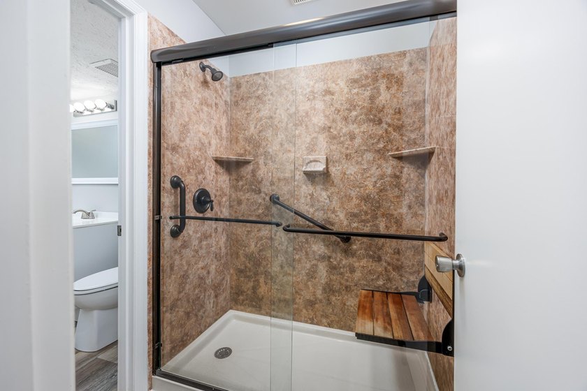 Discover easy coastal living in this beautifully renovated - photo 20