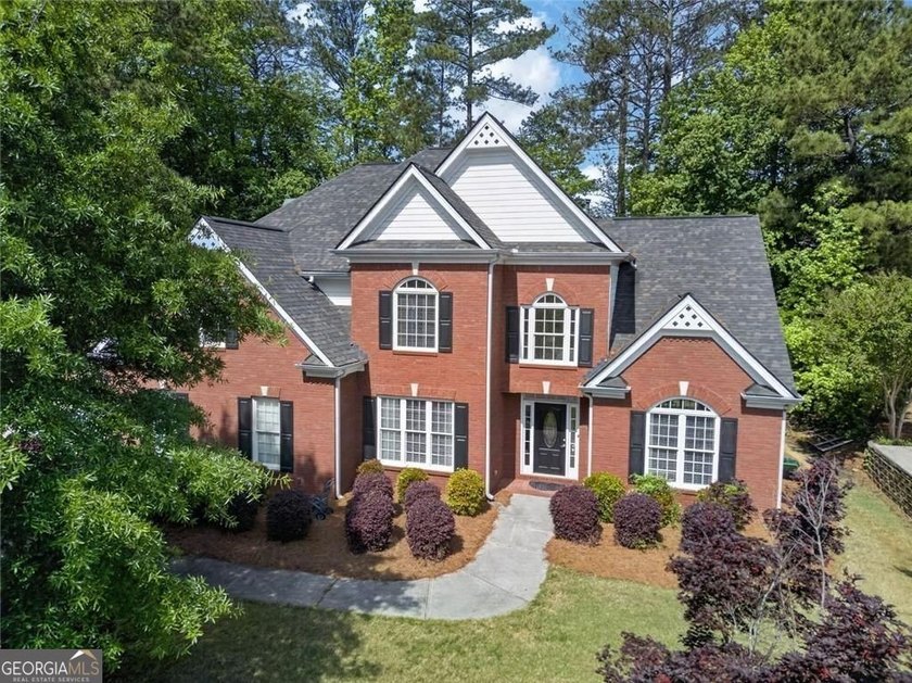 Welcome to 1011 Chestnut Creek Drive in the highly sought-after - photo 3