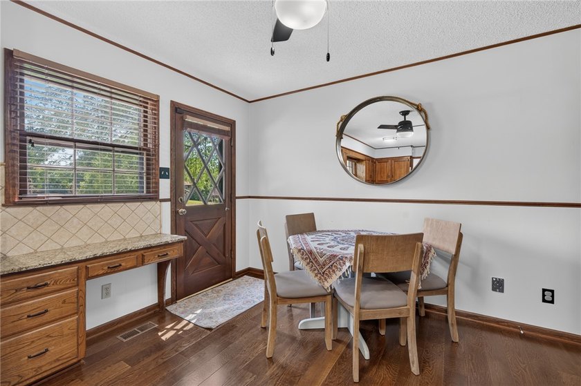 Welcome to this charming Tudor-style home in the Fianna Hills - photo 10