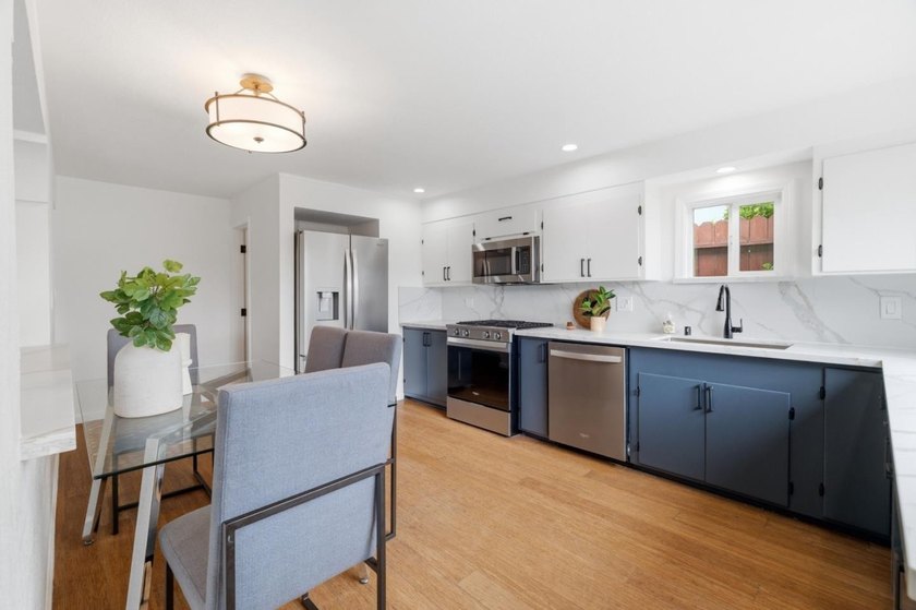 Ideally located on a quiet residential street in the highly - photo 6