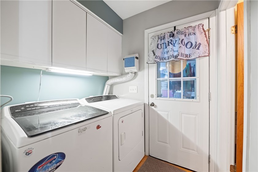 Nestled on a 1.34-acre lot in Webster, this spacious 5-bedroom - photo 12