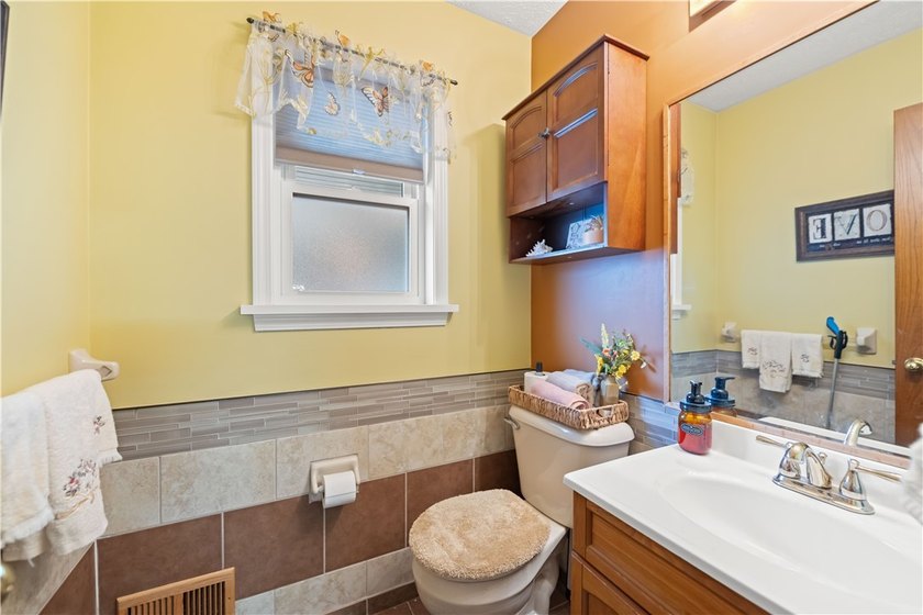 Nestled on a 1.34-acre lot in Webster, this spacious 5-bedroom - photo 13