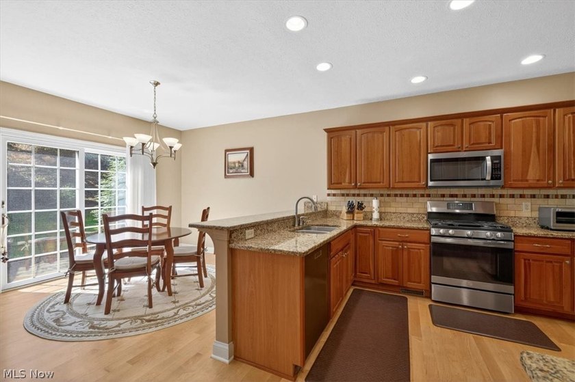 Discover this beautifully updated 3-bedroom cluster home in the - photo 17