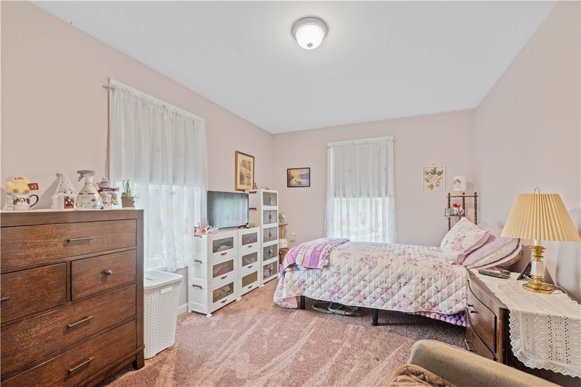 Nestled on a 1.34-acre lot in Webster, this spacious 5-bedroom - photo 19