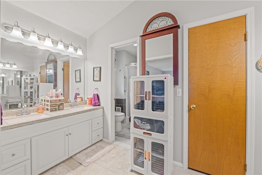 Nestled on a 1.34-acre lot in Webster, this spacious 5-bedroom - photo 23