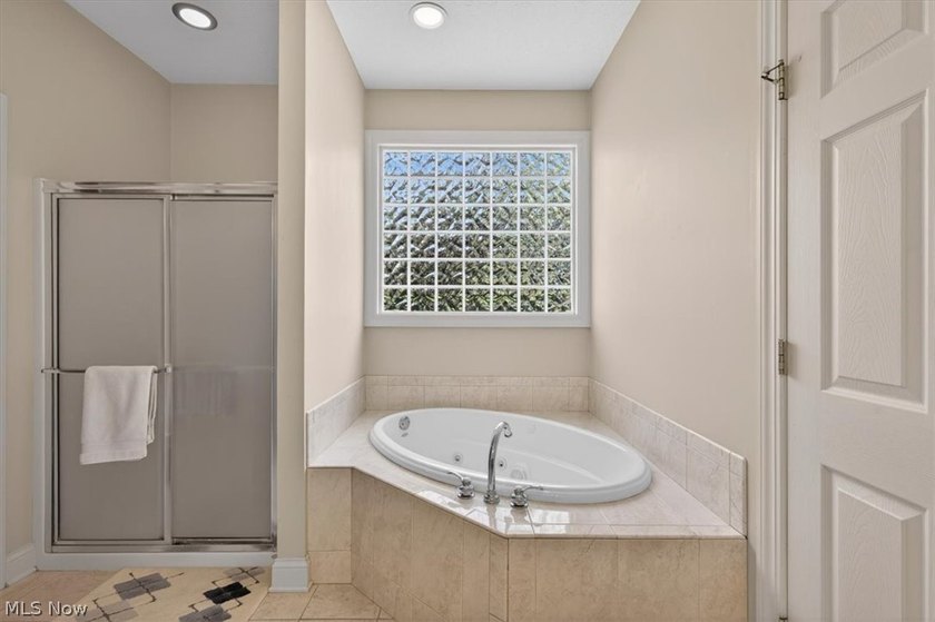 Discover this beautifully updated 3-bedroom cluster home in the - photo 32