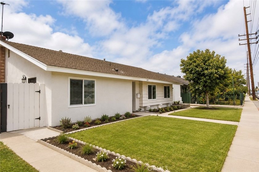 Beautifully updated property featuring a 4-bedroom, 2-bath main - photo 2