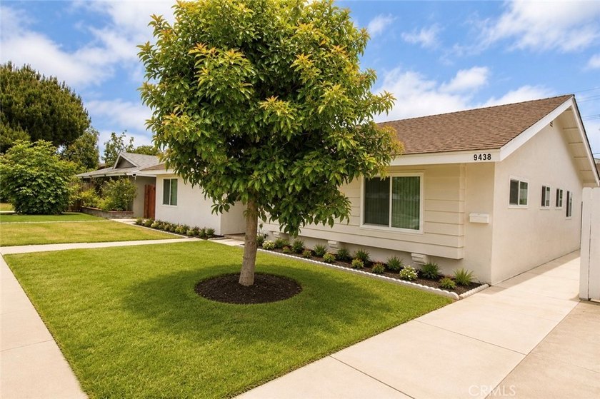 Beautifully updated property featuring a 4-bedroom, 2-bath main - photo 3