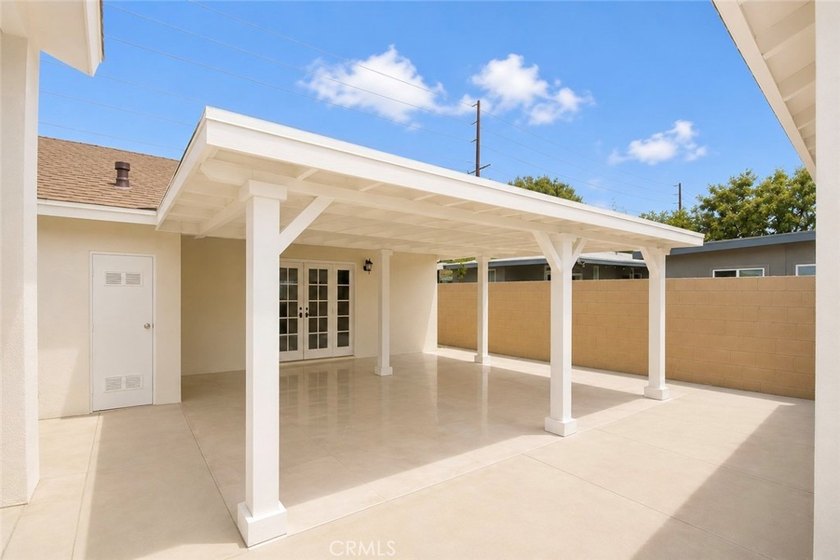 Beautifully updated property featuring a 4-bedroom, 2-bath main - photo 5