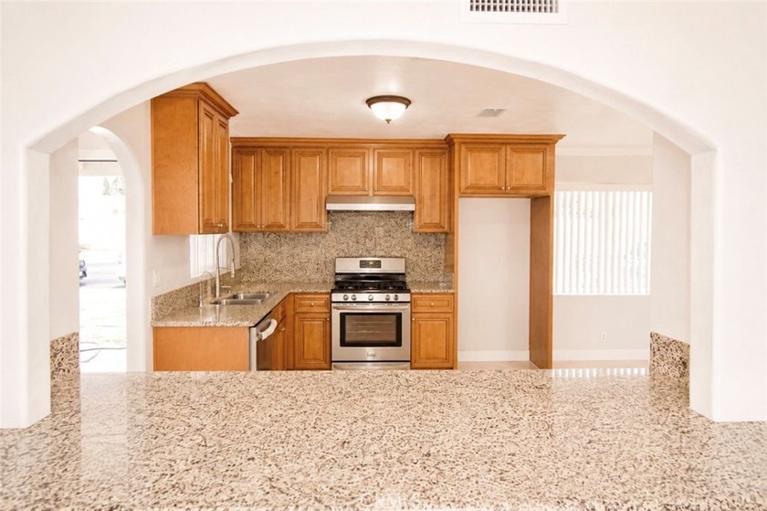 Beautifully updated property featuring a 4-bedroom, 2-bath main - photo 8