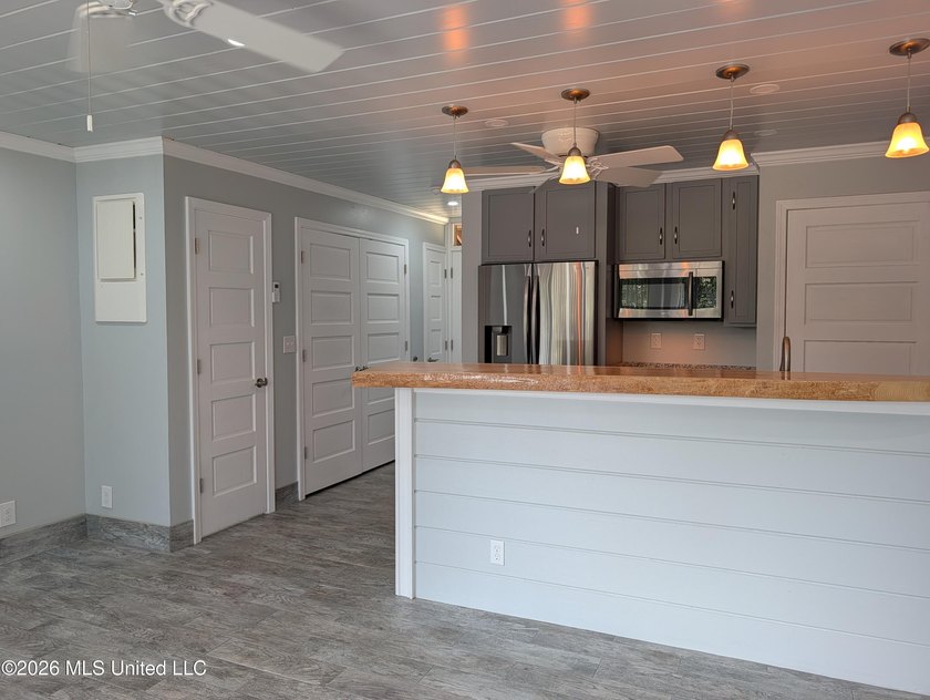 Great Getaway or Perfect for Maintenance-Free Living! Welcome to - photo 17