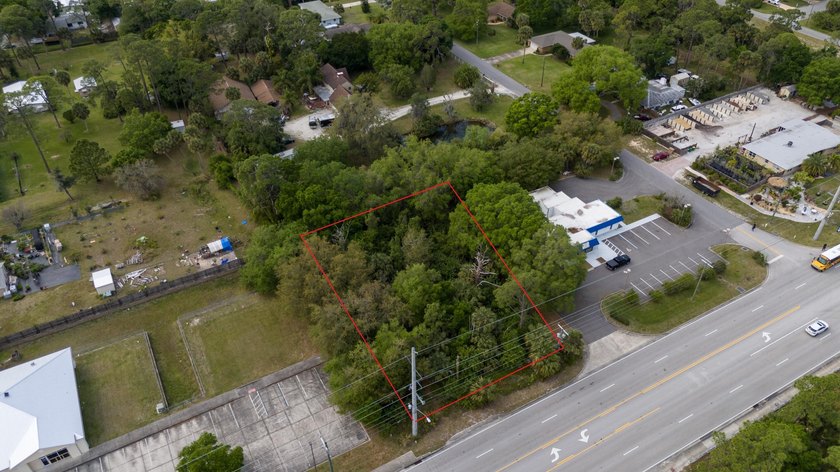 This .48-acre parcel is centrally located between two I-95 - photo 3