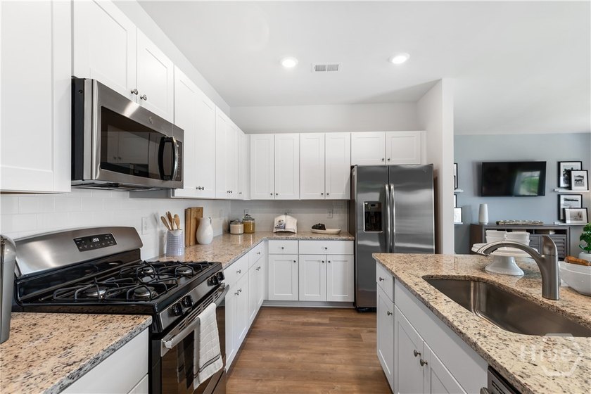 This single-story Hartford home design features an open space - photo 9