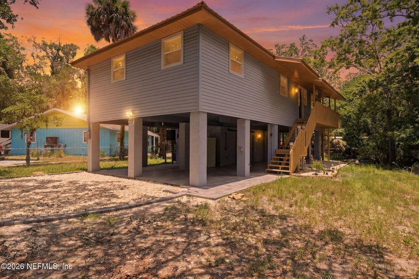 STUNNING WATERFRONT RETREAT! Welcome to your dream coastal home - photo 2