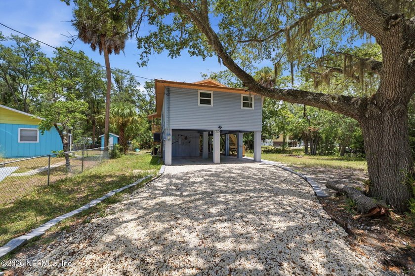 STUNNING WATERFRONT RETREAT! Welcome to your dream coastal home - photo 4