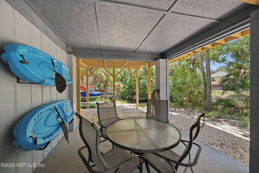 STUNNING WATERFRONT RETREAT! Welcome to your dream coastal home - photo 9