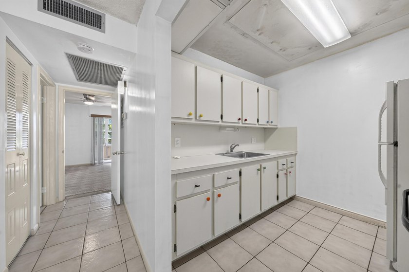 Welcome to this one-bedroom, one-and-a-half-bath condominium in - photo 8