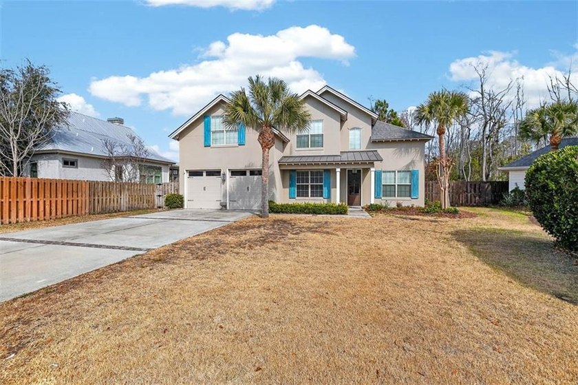 This home has a spacious open concept living area in the great - photo 3
