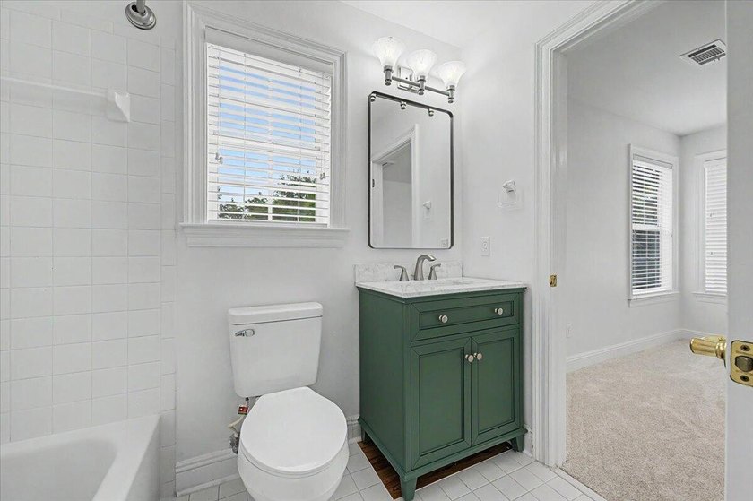 Welcome home to this charming Southern-style residence nestled - photo 39