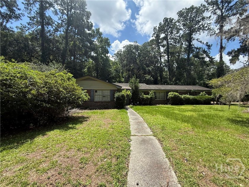 Charming Solid All-Brick 3-Bedroom, 2-Bath Southside Ranch on a - photo 6
