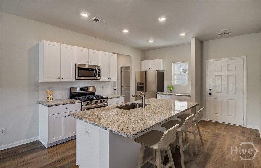 This new Albany home design features a convenient layout with - photo 3