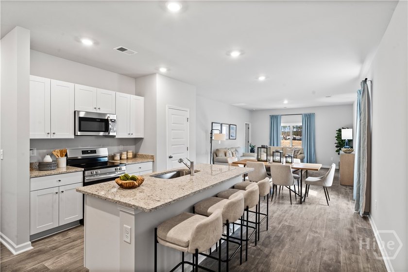 The single-story Annapolis home is a contemporary open layout - photo 5