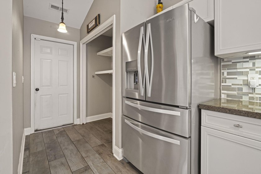 Welcome to 262 Palladium Drive, a beautifully maintained custom - photo 12