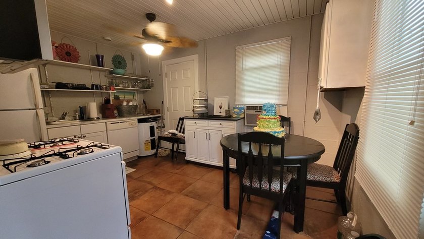 Cute little Cinder Block home with two commercial lots on a busy - photo 2