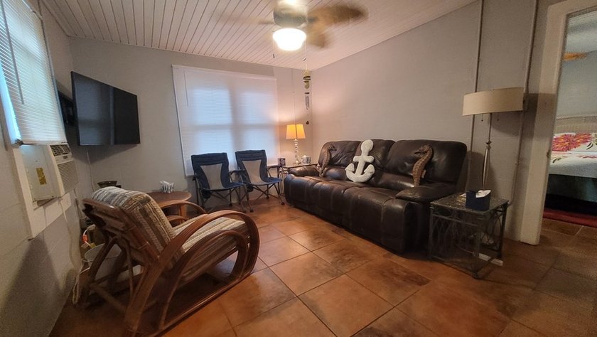 Cute little Cinder Block home with two commercial lots on a busy - photo 5