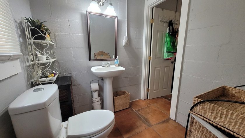 Cute little Cinder Block home with two commercial lots on a busy - photo 10