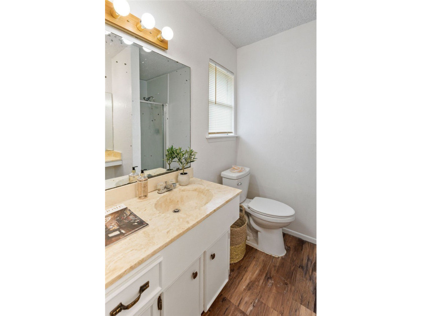 Welcome home to comfort, character, and convenience in the - photo 11