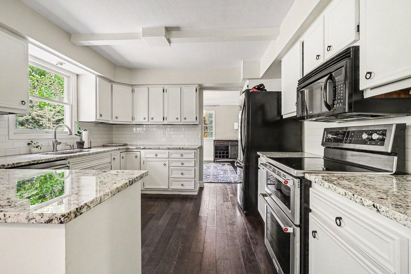 Welcome home to Merrigold Woods! This ideal location is just - photo 11