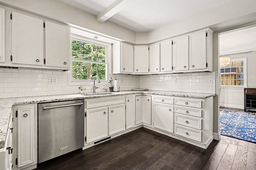 Welcome home to Merrigold Woods! This ideal location is just - photo 12