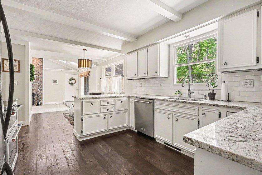 Welcome home to Merrigold Woods! This ideal location is just - photo 13