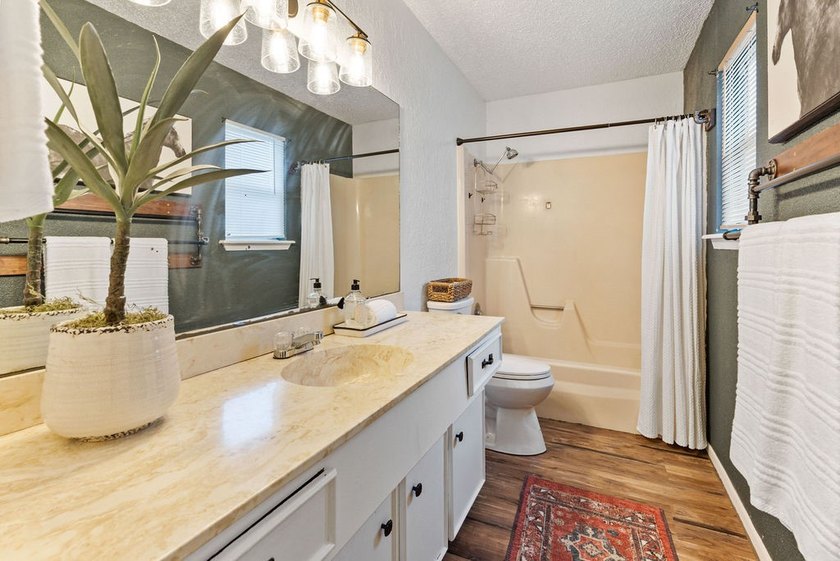Welcome home to comfort, character, and convenience in the - photo 17