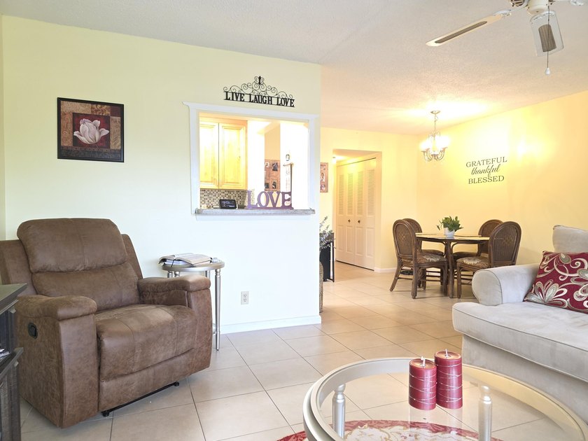 Well-maintained 1-bedroom, 1.5-bath residence featuring granite - photo 6