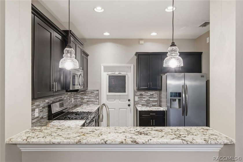 Welcome to maintenance-free living in one of Citrus County's - photo 10